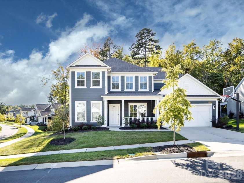 8903 Ansley Park Place, Huntersville, NC 28078.  MLS# CAR4366272, YatesRealty ID 8920. Charming two-story home with inviting front porch, manicured landscaping, and excellent curb appeal in a desirable neighborhood.