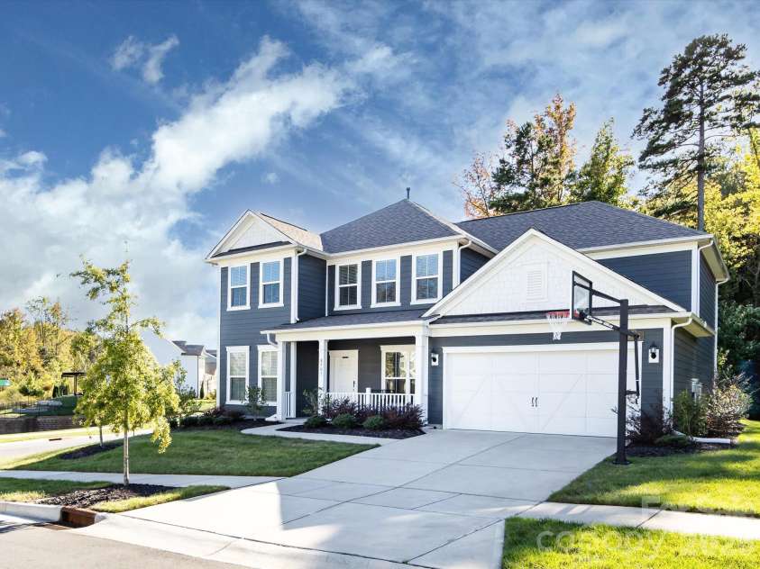 8903 Ansley Park Place, Huntersville, NC 28078.  MLS# CAR4366272, YatesRealty ID 8920. Charming two-story home with inviting front porch, manicured landscaping, and excellent curb appeal in a desirable neighborhood.
