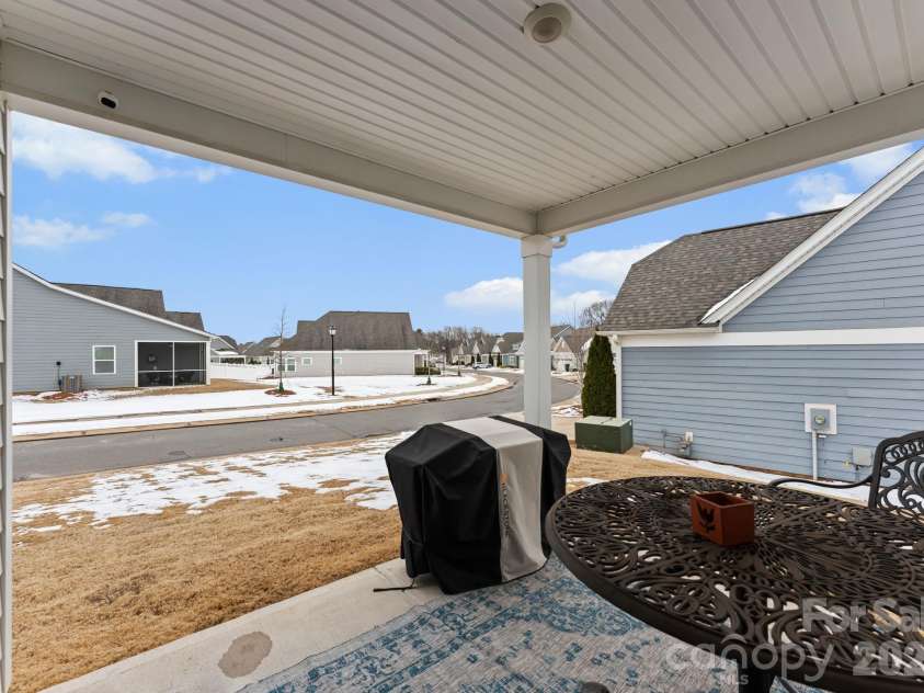 2004 Bonds Lane, Fort Mill, SC 29715.  MLS# CAR4343014, YatesRealty ID 8926. Covered Back Patio
