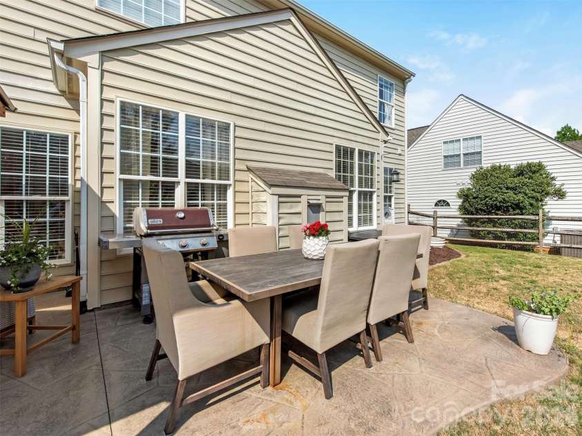 2306 Winthorp Ridge Road, Charlotte, NC 28270.  MLS# CAR4364303, YatesRealty ID 8930. Back Patio has additional area for dining & grilling.