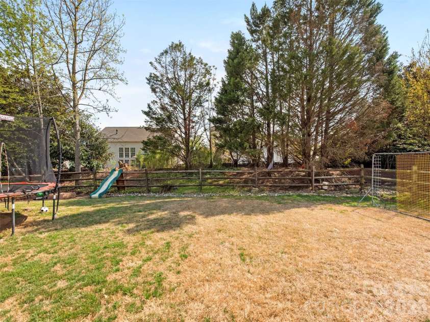2306 Winthorp Ridge Road, Charlotte, NC 28270.  MLS# CAR4364303, YatesRealty ID 8930. Nice flat backyard!