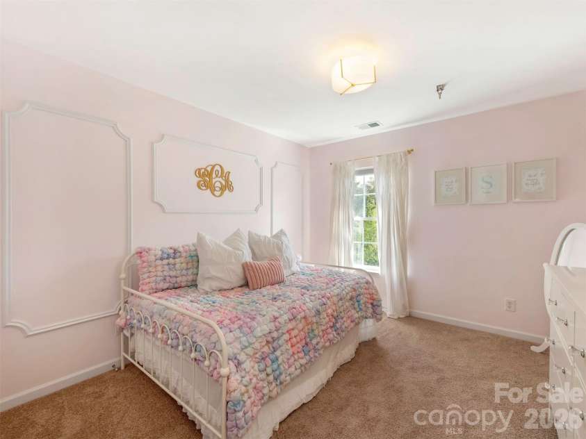 2306 Winthorp Ridge Road, Charlotte, NC 28270.  MLS# CAR4364303, YatesRealty ID 8930. Second Bedroom with wainscotting and updated lighting.