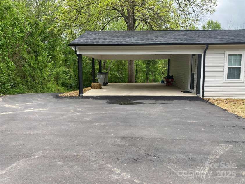 1244 Piedmont Drive, Lenoir, NC 28645.  MLS# CAR4250326, YatesRealty ID 8935. Carport - driveway