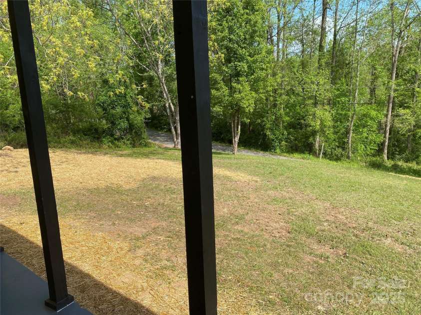 1244 Piedmont Drive, Lenoir, NC 28645.  MLS# CAR4250326, YatesRealty ID 8935. Front porch overlooking from yard