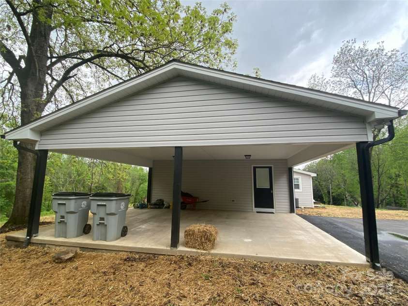 1244 Piedmont Drive, Lenoir, NC 28645.  MLS# CAR4250326, YatesRealty ID 8935. Very nice double carport