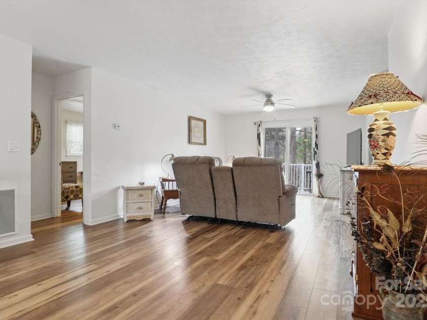 114 Falling Waters Road, Hendersonville, NC 28792.  MLS# CAR4228778, YatesRealty ID 8938. Dining area allows for most table configurations