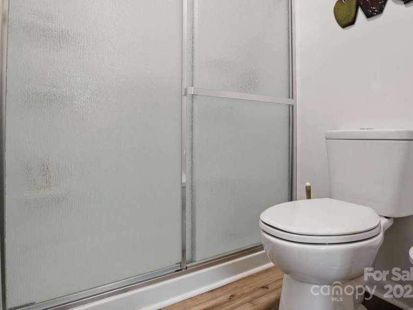 114 Falling Waters Road, Hendersonville, NC 28792.  MLS# CAR4228778, YatesRealty ID 8938. Large shower!