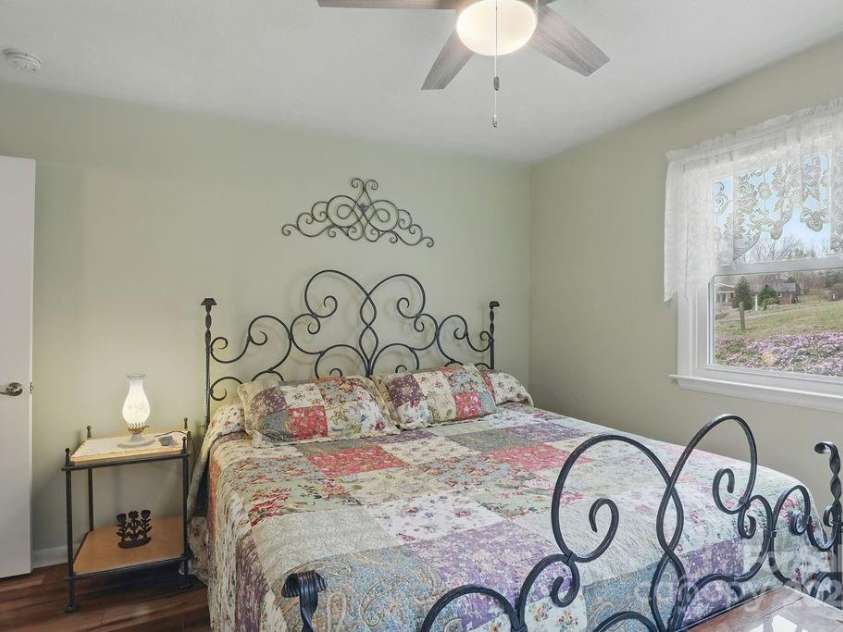 114 Falling Waters Road, Hendersonville, NC 28792.  MLS# CAR4228778, YatesRealty ID 8938. Second bedroom at the front of the home