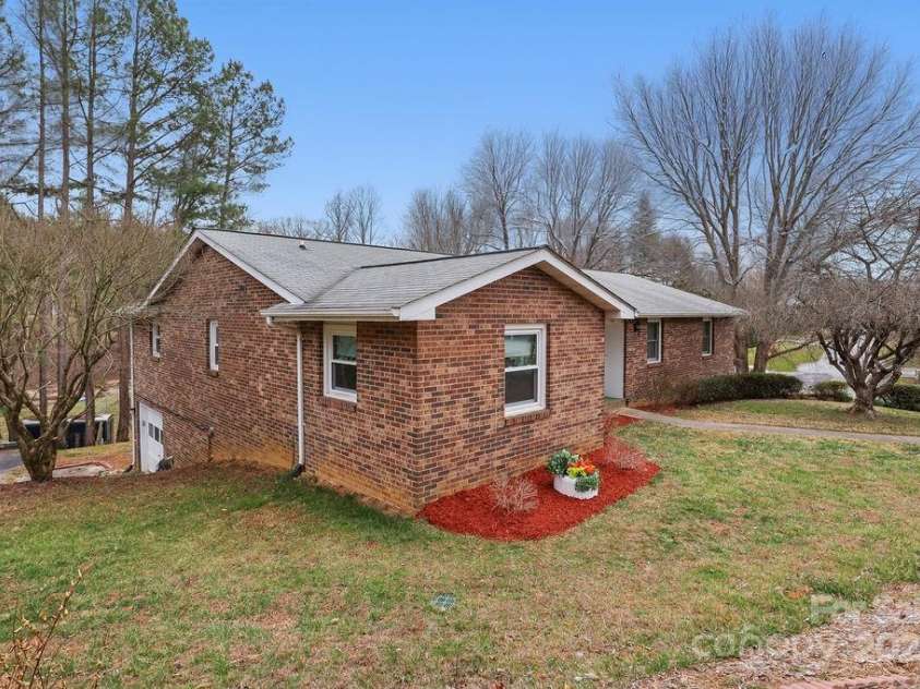 114 Falling Waters Road, Hendersonville, NC 28792.  MLS# CAR4228778, YatesRealty ID 8938. Sweet Falling Waters!