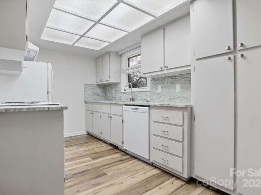 114 Falling Waters Road, Hendersonville, NC 28792.  MLS# CAR4228778, YatesRealty ID 8938. Updated unit ready for move-in!