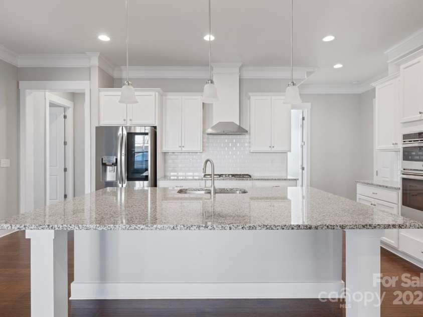 704 Kenway Loop, Mooresville, NC 28117.  MLS# CAR4274893, YatesRealty ID 894. Roomy kitchen