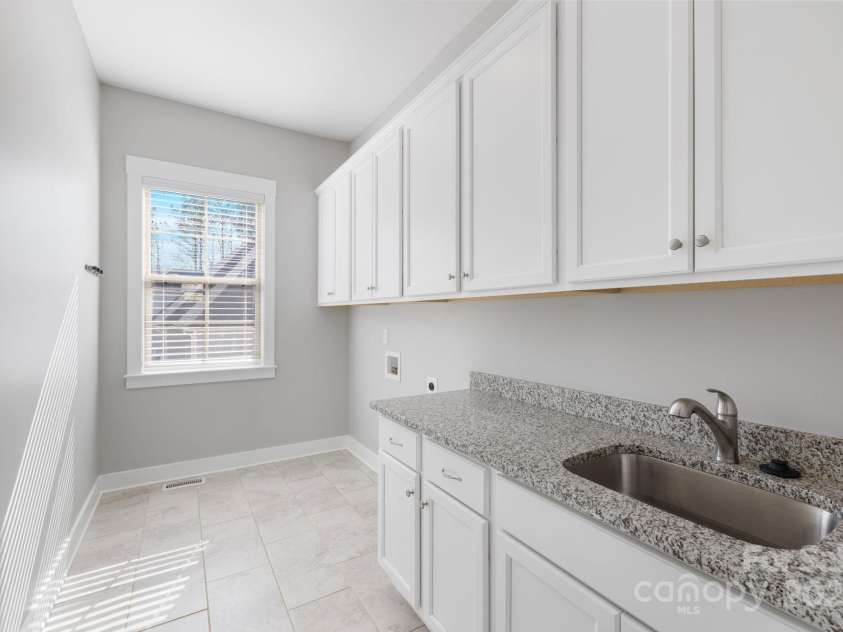704 Kenway Loop, Mooresville, NC 28117.  MLS# CAR4274893, YatesRealty ID 894. Spacious laundry room