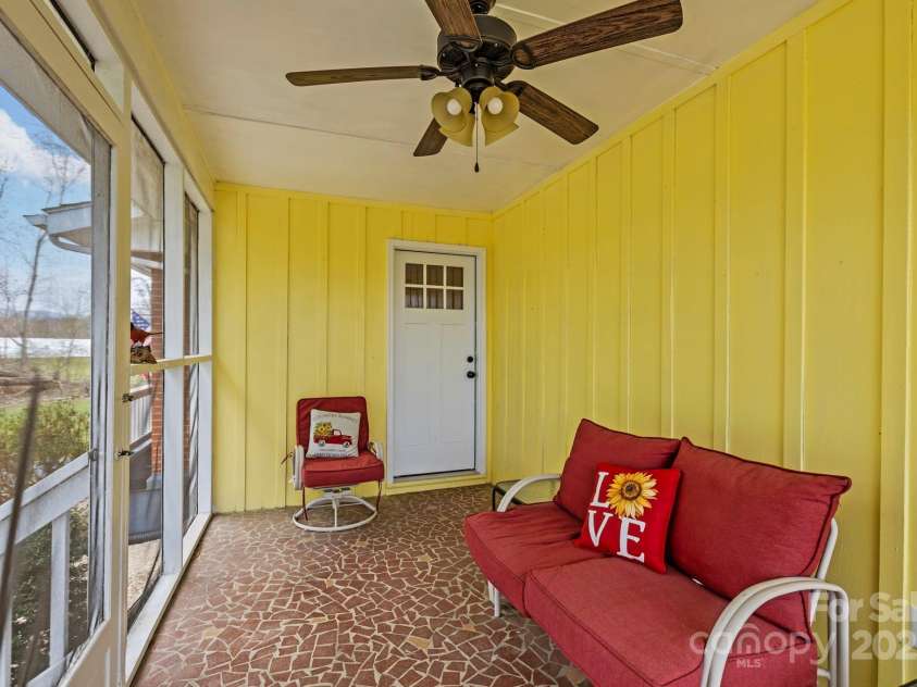 1450 Cane Creek Road, Fletcher, NC 28732.  MLS# CAR4241645, YatesRealty ID 8942. Screened in Porch