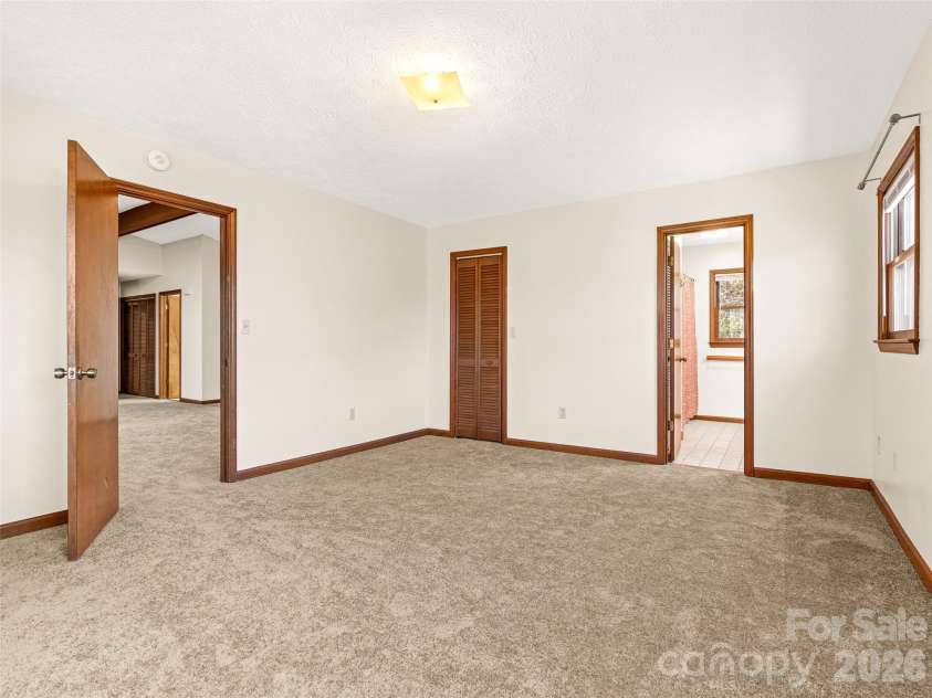86 View De Lake Drive, Etowah, NC 28729.  MLS# CAR4361060, YatesRealty ID 8945. Primary Bedroom