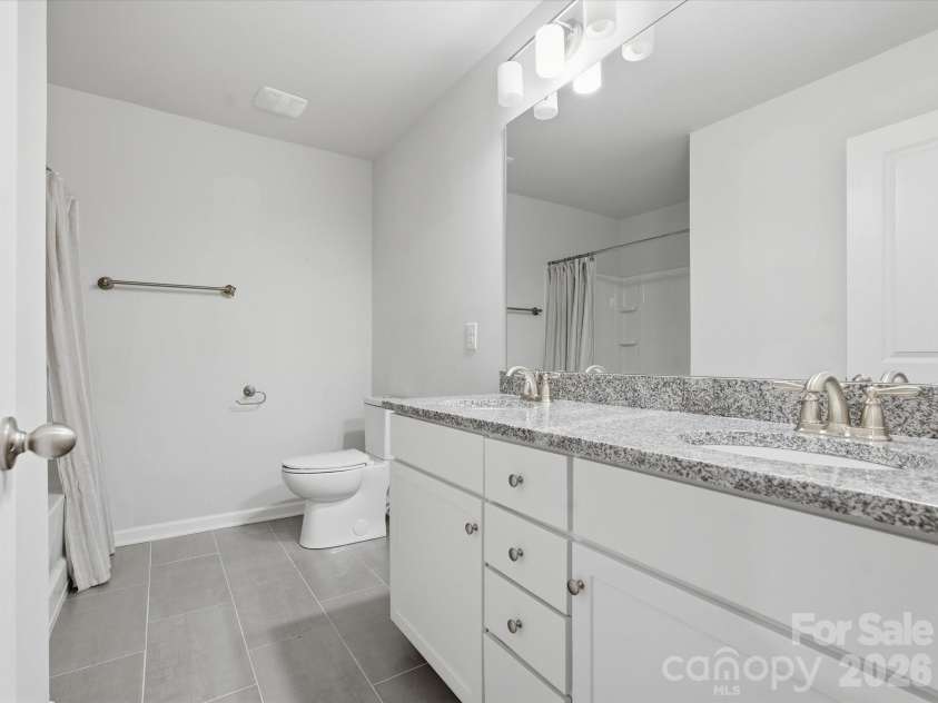 535 Cowans Villa Road, Staley, NC 28164.  MLS# CAR4336147, YatesRealty ID 895. Hallway bathroom 