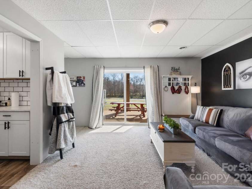 732 Crowe Dairy Road, Forest City, NC 28043.  MLS# CAR4234052, YatesRealty ID 895. Family room in walkout basement.