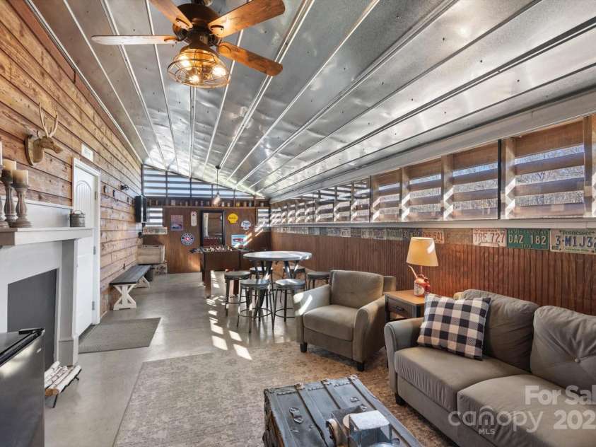 732 Crowe Dairy Road, Forest City, NC 28043.  MLS# CAR4234052, YatesRealty ID 895. Groom quarters with foosball and TV.