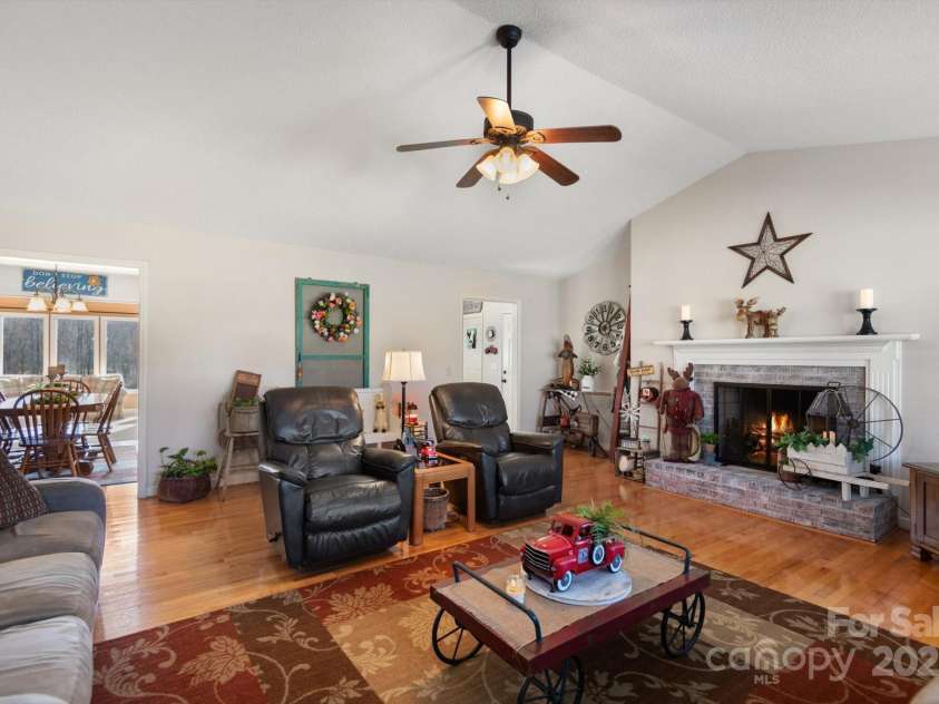 732 Crowe Dairy Road, Forest City, NC 28043.  MLS# CAR4234052, YatesRealty ID 895. Vaulted ceilings in living room with fireplace.