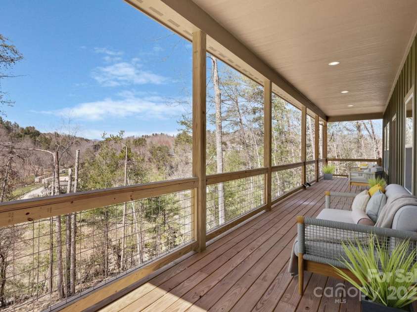 44 Judith Drive, Leicester, NC 28748.  MLS# CAR4193291, YatesRealty ID 8950. Covered deck staged