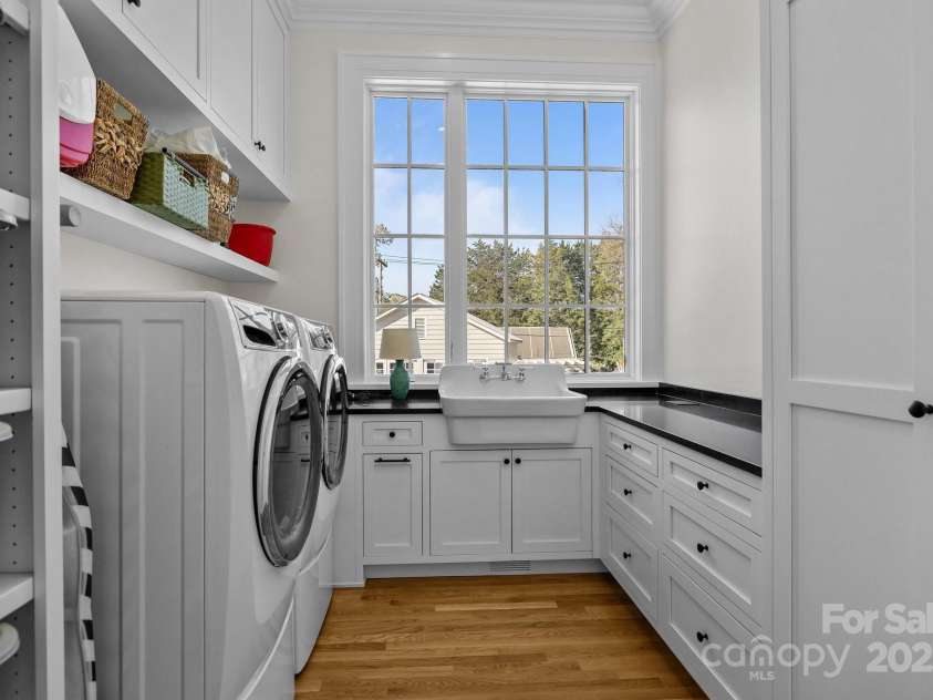 1212 Queens Road, Charlotte, NC 28207.  MLS# CAR4241756, YatesRealty ID 8954. Laundry room