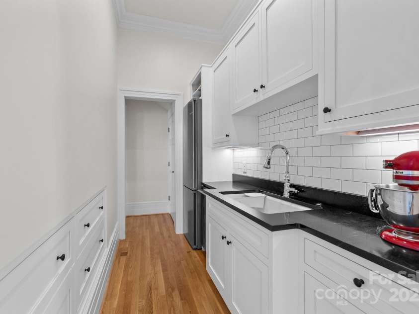 1212 Queens Road, Charlotte, NC 28207.  MLS# CAR4241756, YatesRealty ID 8954. Scullery with 2nd dishwasher & refrigerator