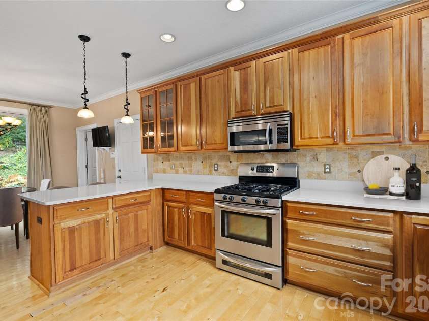 23 Clear Vista Drive, Asheville, NC 28805.  MLS# CAR4301123, YatesRealty ID 8954. Kitchen Virtually Staged