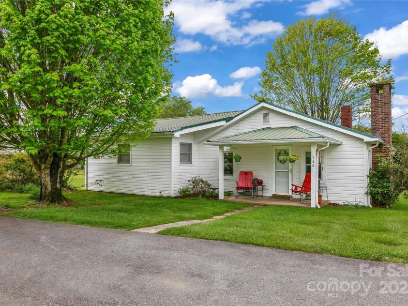 128 Summit Avenue, Brevard, NC 28712.  MLS# CAR4250495, YatesRealty ID 8957. Lovely Cottage in the city limits