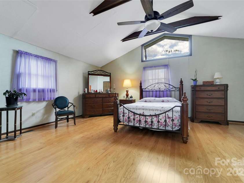 128 Summit Avenue, Brevard, NC 28712.  MLS# CAR4250495, YatesRealty ID 8957. Primary bedroom