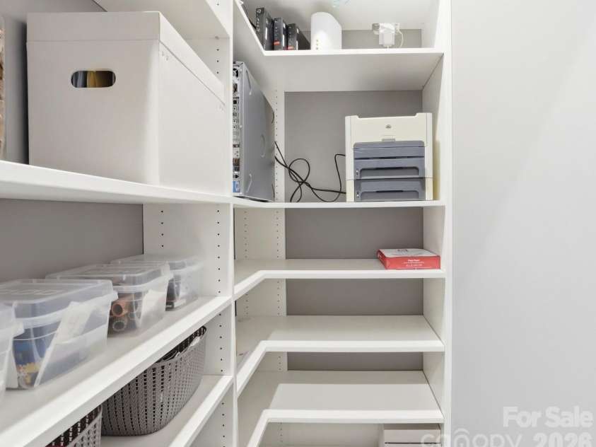 2033 Poplar Ridge Drive, Monroe, NC 28110.  MLS# CAR4358486, YatesRealty ID 8957. Tech Closet/ 2nd Pantry