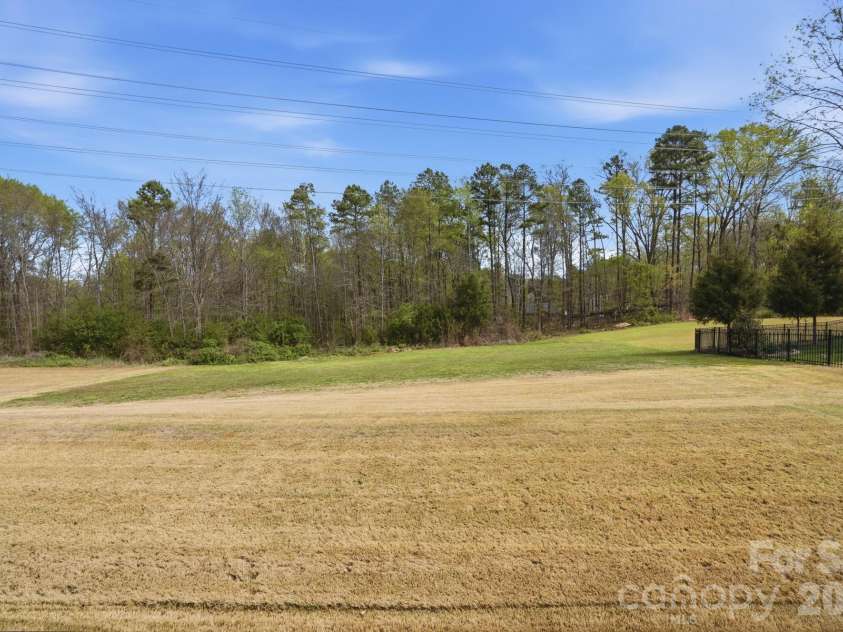 2033 Poplar Ridge Drive, Monroe, NC 28110.  MLS# CAR4358486, YatesRealty ID 8957. The Backyard just keeps going