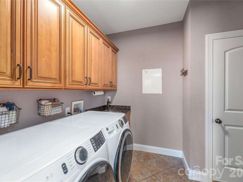 11 Briar Ridge Drive, Fairview, NC 28730.  MLS# CAR4350969, YatesRealty ID 8958. Laundry Room