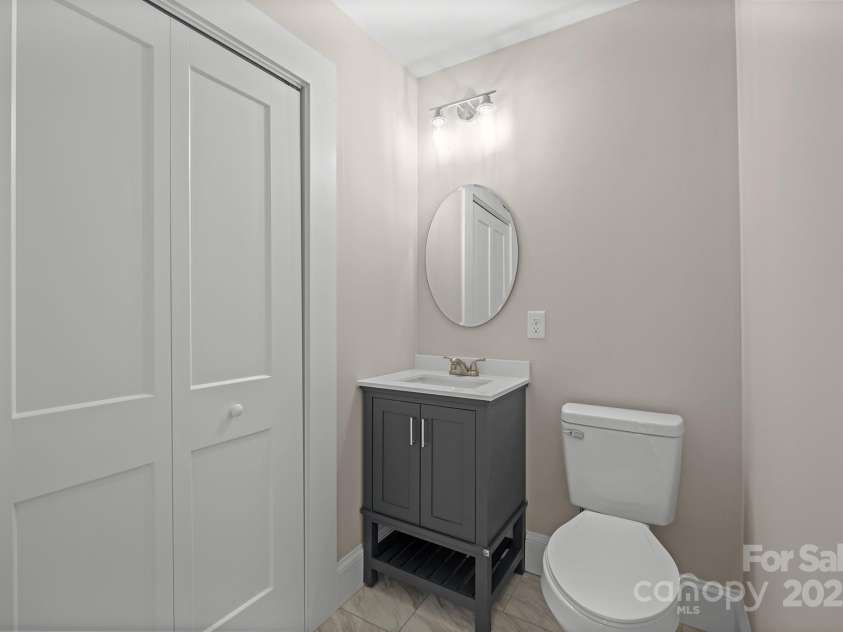 1108 Lutz Street, Valdese, NC 28690.  MLS# CAR4203045, YatesRealty ID 8959. Half Bath (attached to Primary Bedroom)