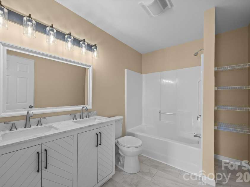 25 Byrd Road, Black Mountain, NC 28711.  MLS# CAR4338401, YatesRealty ID 8959. Bath updated with Double Vanity