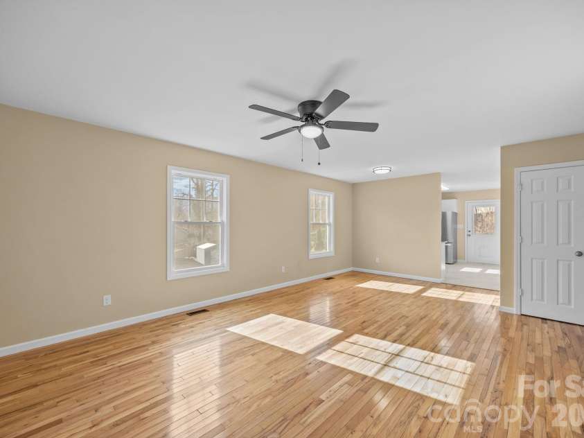 25 Byrd Road, Black Mountain, NC 28711.  MLS# CAR4338401, YatesRealty ID 8959. Living and Dining Areas