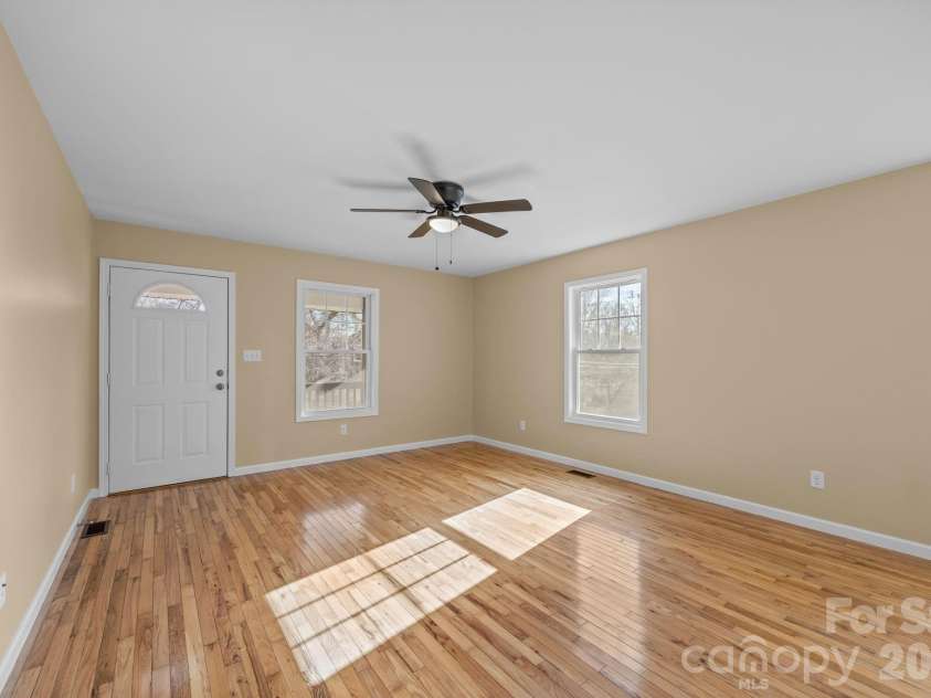 25 Byrd Road, Black Mountain, NC 28711.  MLS# CAR4338401, YatesRealty ID 8959. Living Room 