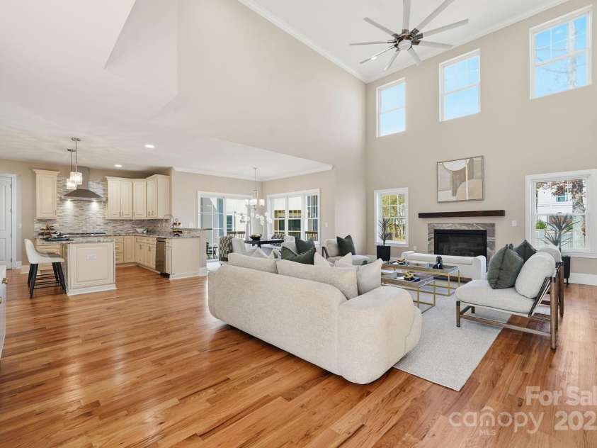 101 Mcalway Road, Charlotte, NC 28211.  MLS# CAR4321405, YatesRealty ID 896. Dining room shown from the foyer — bright, open, and beautifully staged.