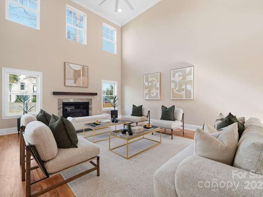 101 Mcalway Road, Charlotte, NC 28211.  MLS# CAR4321405, YatesRealty ID 896. Dining room with stylish artwork and refined finishes — perfect for entertaining.