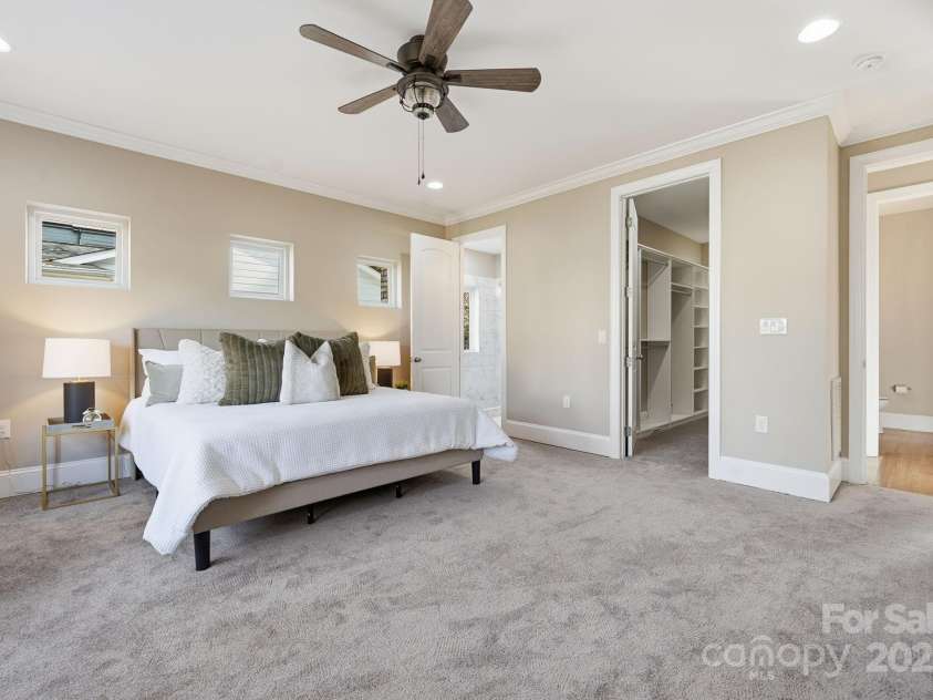 101 Mcalway Road, Charlotte, NC 28211.  MLS# CAR4321405, YatesRealty ID 896.  Primary suite entry showcasing the spacious layout and direct access to the spa-inspired bath.
