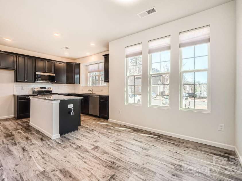 1111 Johns Walk Way, Belmont, NC 28012.  MLS# CAR4239700, YatesRealty ID 8960. Kitchen and dining area