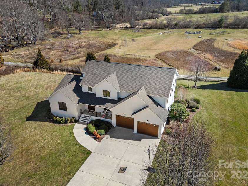 28 Sovereign Lane, Fairview, NC 28730.  MLS# CAR4226079, YatesRealty ID 8961. Charming exterior, timeless appeal