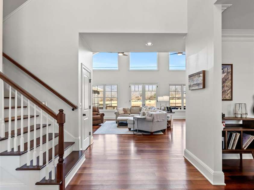 28 Sovereign Lane, Fairview, NC 28730.  MLS# CAR4226079, YatesRealty ID 8961. Stairs to upper level