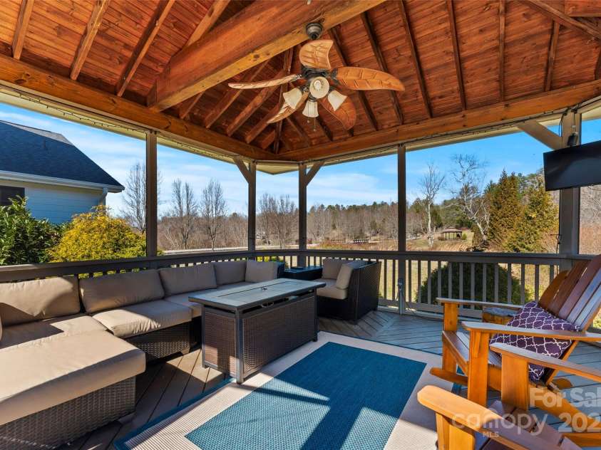 28 Sovereign Lane, Fairview, NC 28730.  MLS# CAR4226079, YatesRealty ID 8961. Watch the game, sip a drink, feel the breeze