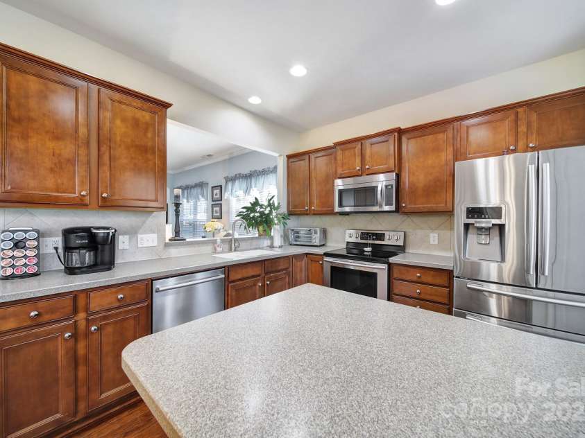 5011 Broad Lane, Fort Mill, SC 29707.  MLS# CAR4239090, YatesRealty ID 8969. Kitchen w/ Peninsula