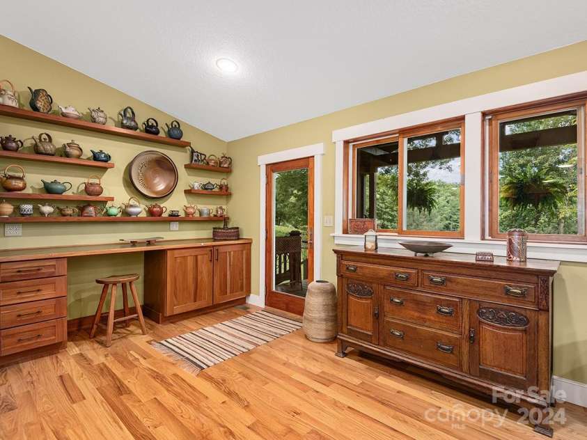 184 Upper White Oak Road, Mars Hill, NC 28754.  MLS# CAR4187288, YatesRealty ID 897. Custom cherry cabinets and shelving.