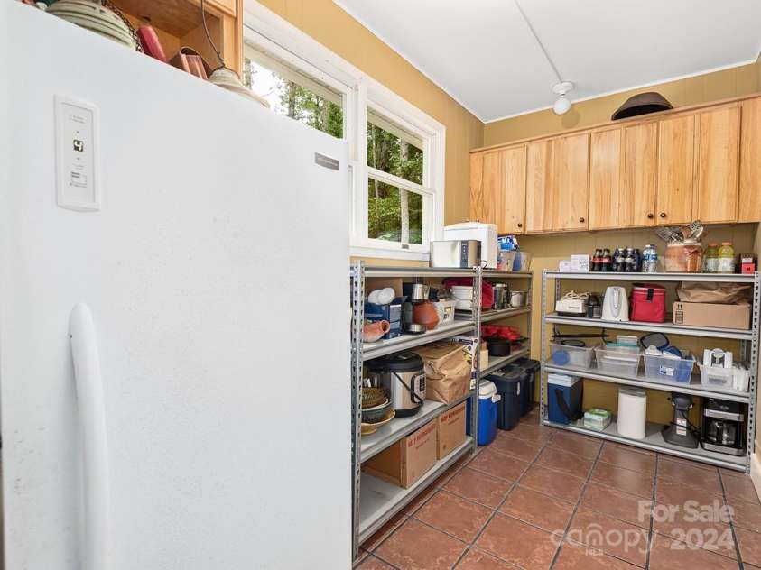 184 Upper White Oak Road, Mars Hill, NC 28754.  MLS# CAR4187288, YatesRealty ID 897. Pantry space off the kitchen and garage.