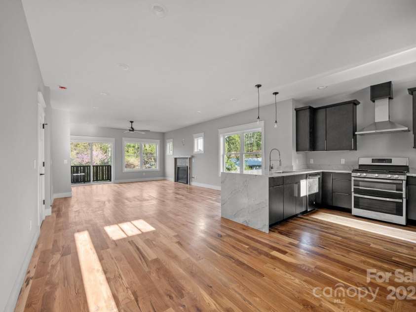 64 Pinedale Road, Asheville, NC 28805.  MLS# CAR4210375, YatesRealty ID 8970. Large kitchen in front