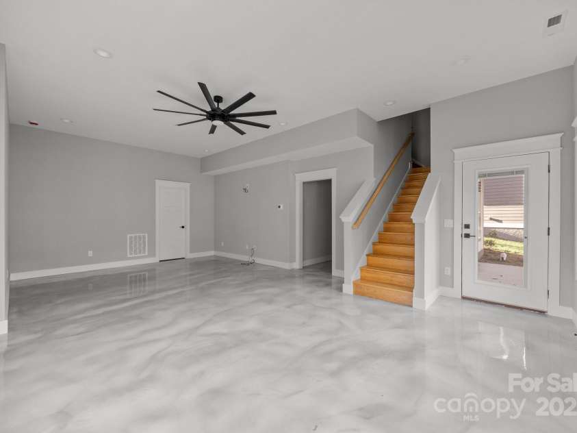 64 Pinedale Road, Asheville, NC 28805.  MLS# CAR4210375, YatesRealty ID 8970. Lower level living space