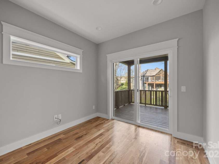 64 Pinedale Road, Asheville, NC 28805.  MLS# CAR4210375, YatesRealty ID 8970. Main level office space with deck access
