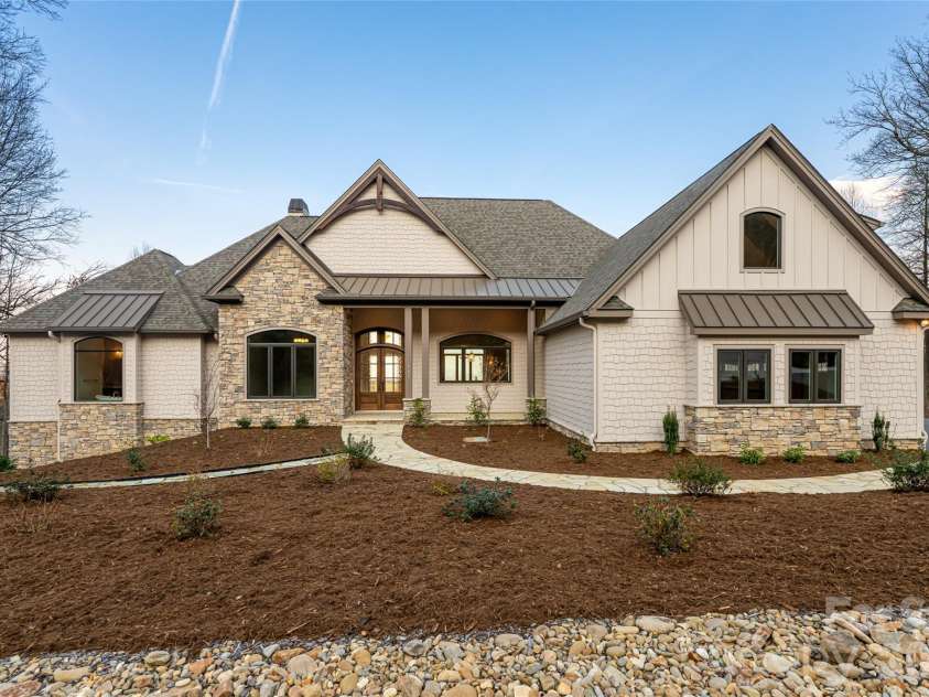 527 Falkirk Way, Zirconia, NC 28790.  MLS# CAR4364609, YatesRealty ID 8977. Beautiful landscaping and hardscapes