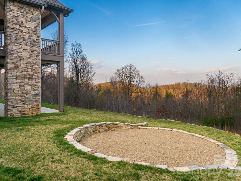 527 Falkirk Way, Zirconia, NC 28790.  MLS# CAR4364609, YatesRealty ID 8977. Hardscaped Patio is ready for a firepit